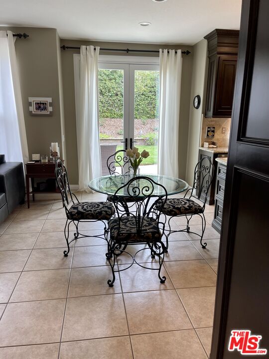 152 Park Hill Road Simi Valley, CA 93065 - Photo 10 of 16 a living room with furniture and a floor to ceiling window