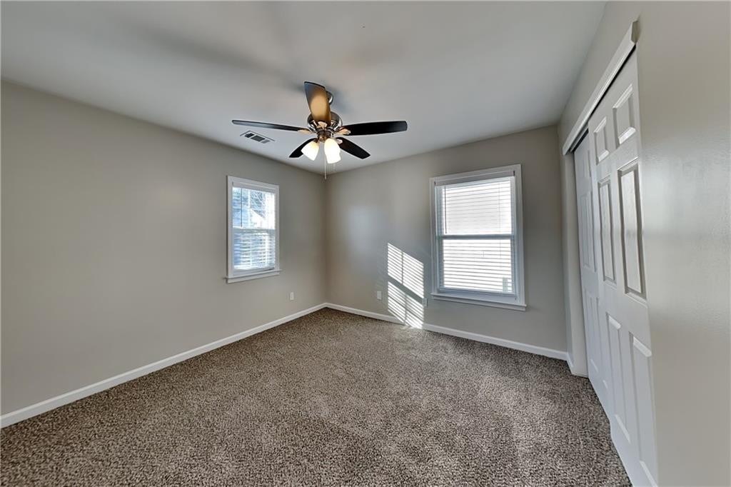 40 Parkmont Court Dallas, GA 30132 - Photo 15 of 19 a view of an empty room with a window