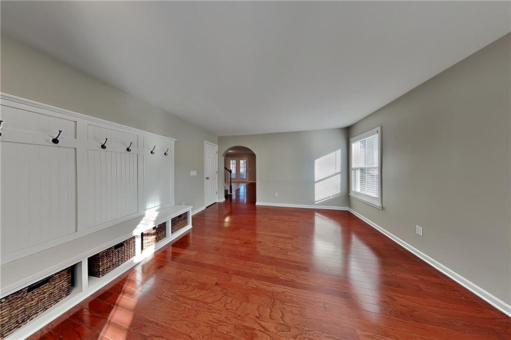 40 Parkmont Court Dallas, GA 30132 - Photo 4 of 19 a view of an empty room with wooden floor and a window