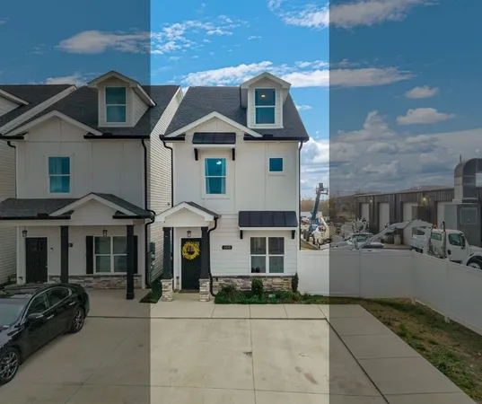 a front view of a house with yard