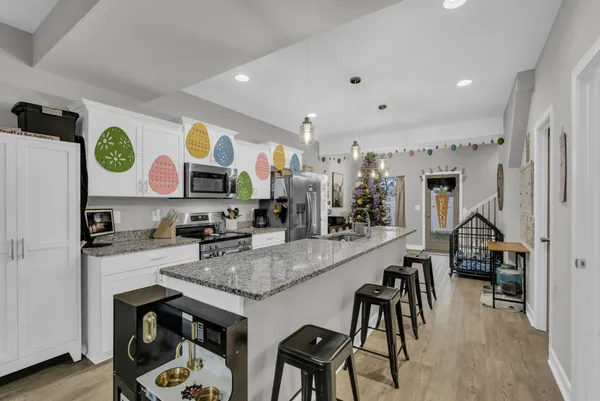 a kitchen with granite countertop lots of counter top space
