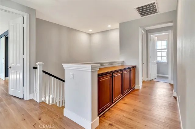 a view of entryway with wooden floor