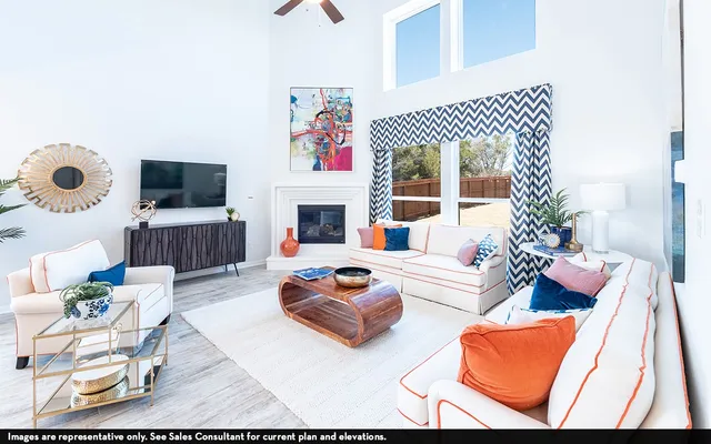a living room with furniture fireplace and a flat screen tv