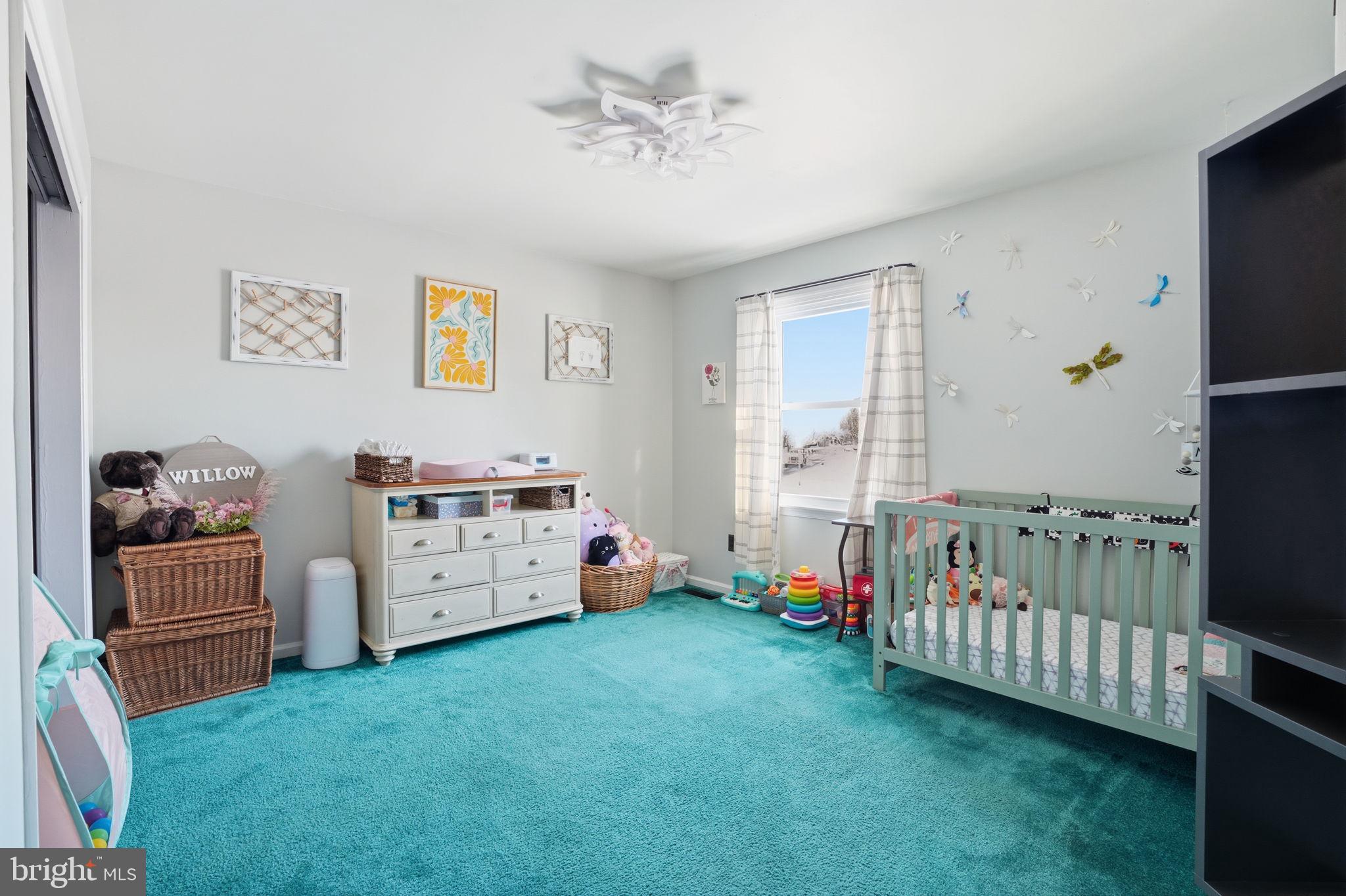 937 High Pointe Circle Langhorne, PA 19047 - Photo 17 of 47 a view of a bedroom with baby crib and windows