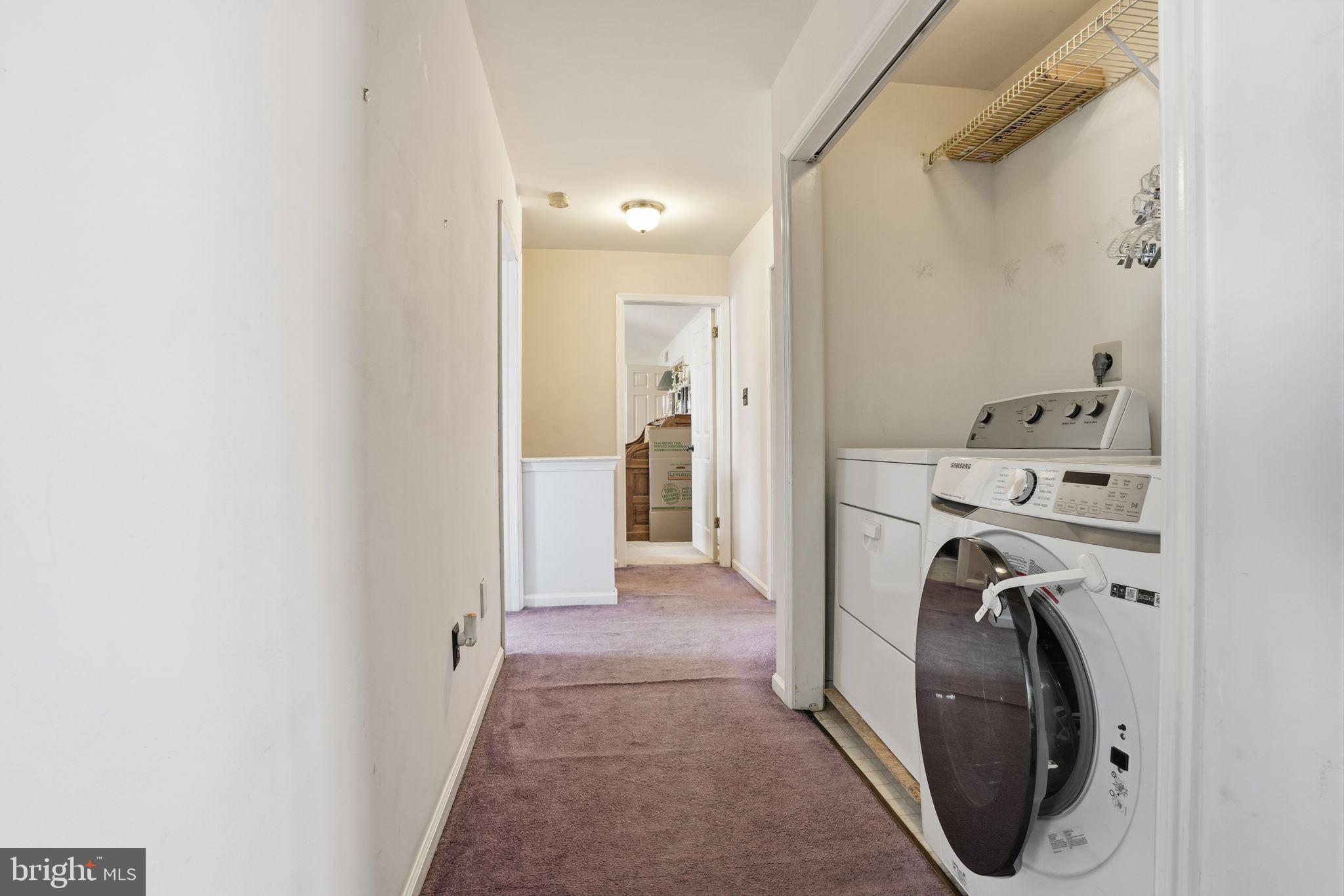 937 High Pointe Circle Langhorne, PA 19047 - Photo 21 of 47 a view of a hallway with washer and dryer