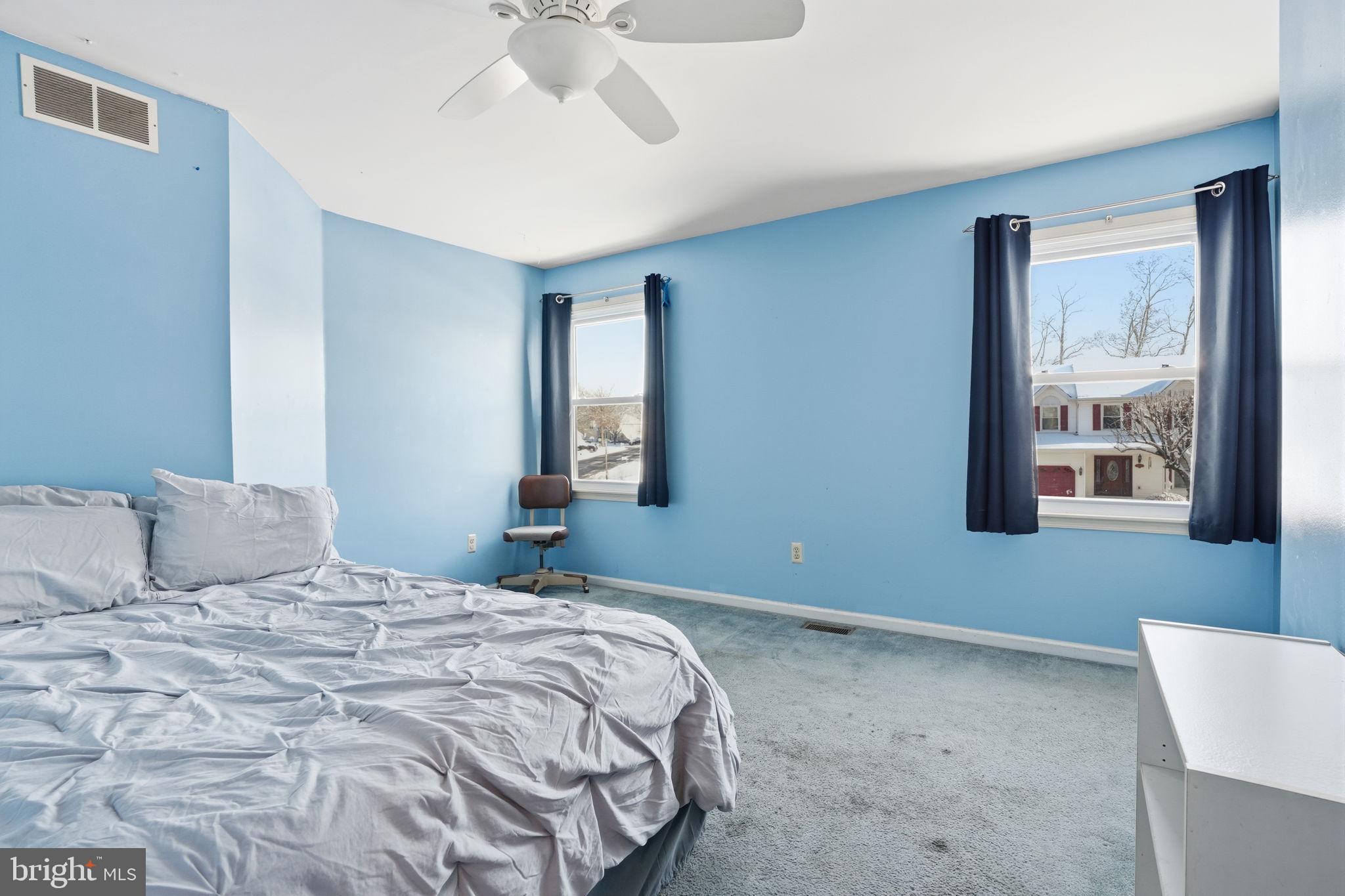 937 High Pointe Circle Langhorne, PA 19047 - Photo 25 of 47 a bedroom with a bed and a window