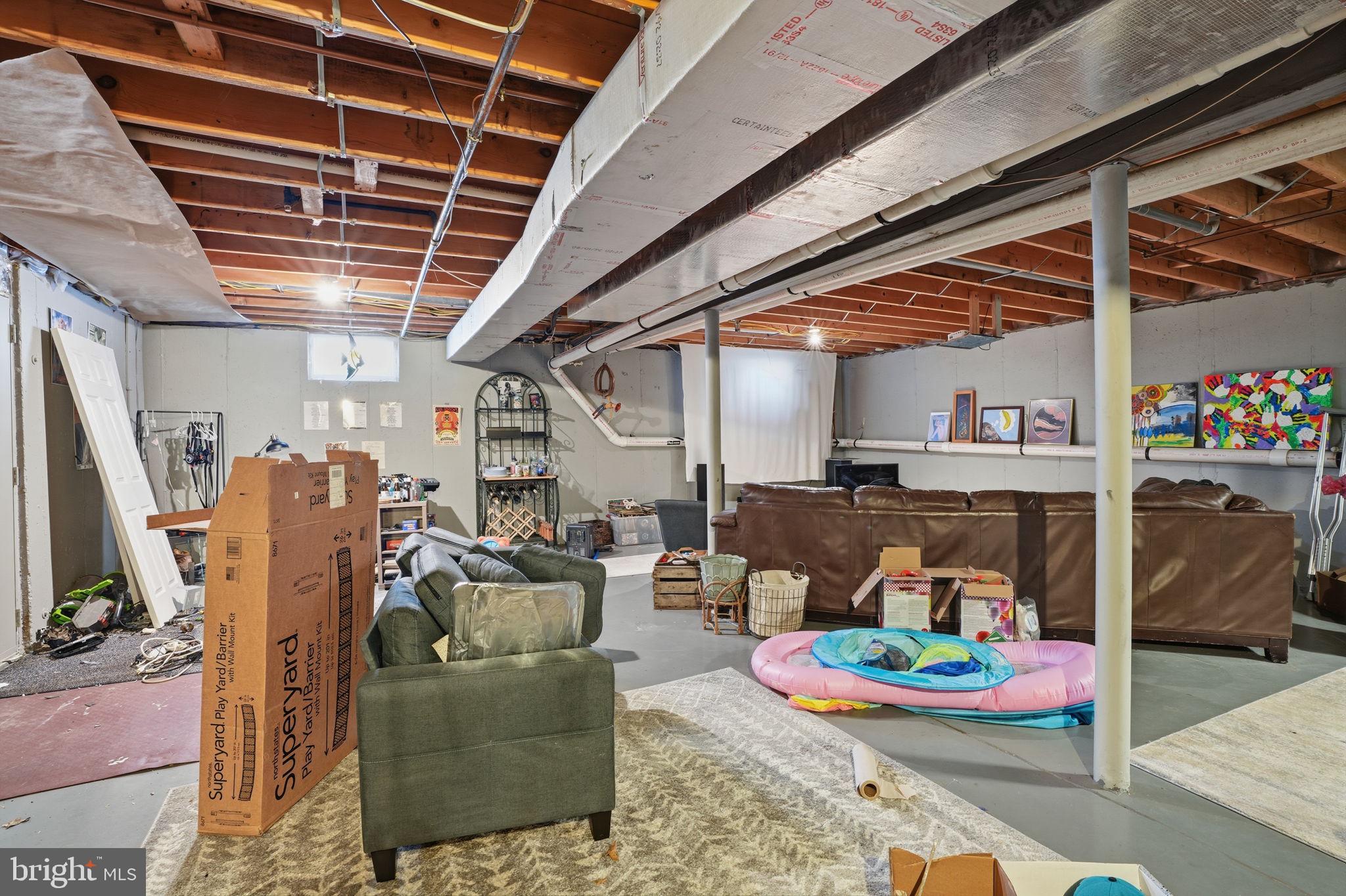 937 High Pointe Circle Langhorne, PA 19047 - Photo 29 of 47 a living room with furniture and a flat screen tv
