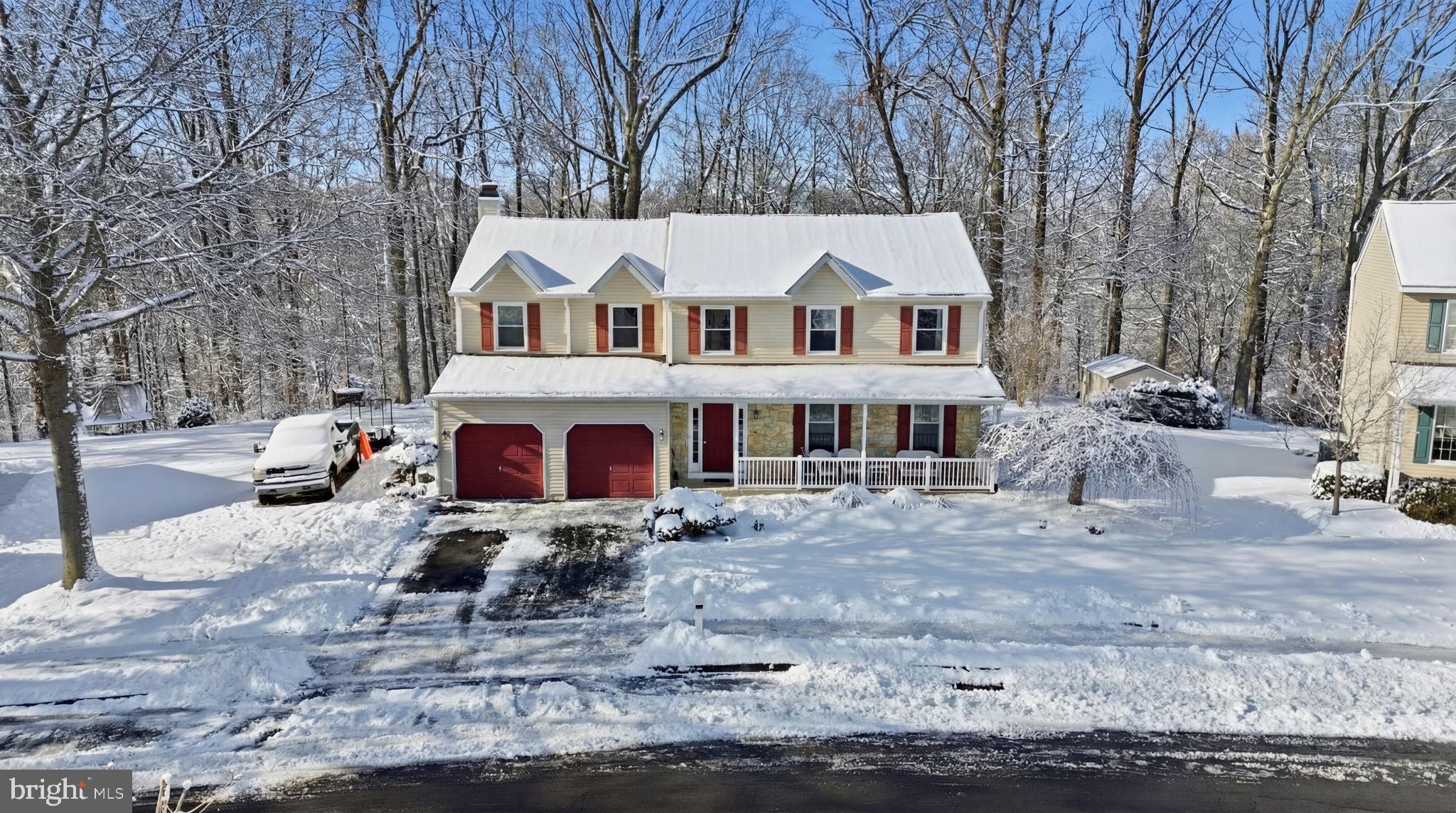 937 High Pointe Circle Langhorne, PA 19047 - Photo 38 of 47 a front view of a house with large trees
