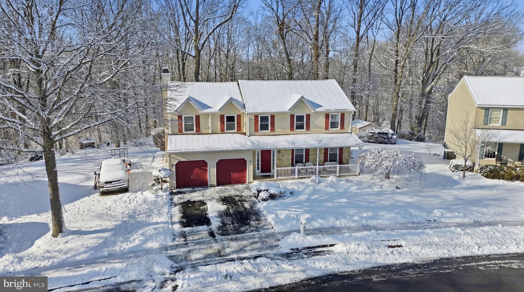 937 High Pointe Circle Langhorne, PA 19047 - Photo 39 of 47 a front view of a house with large trees