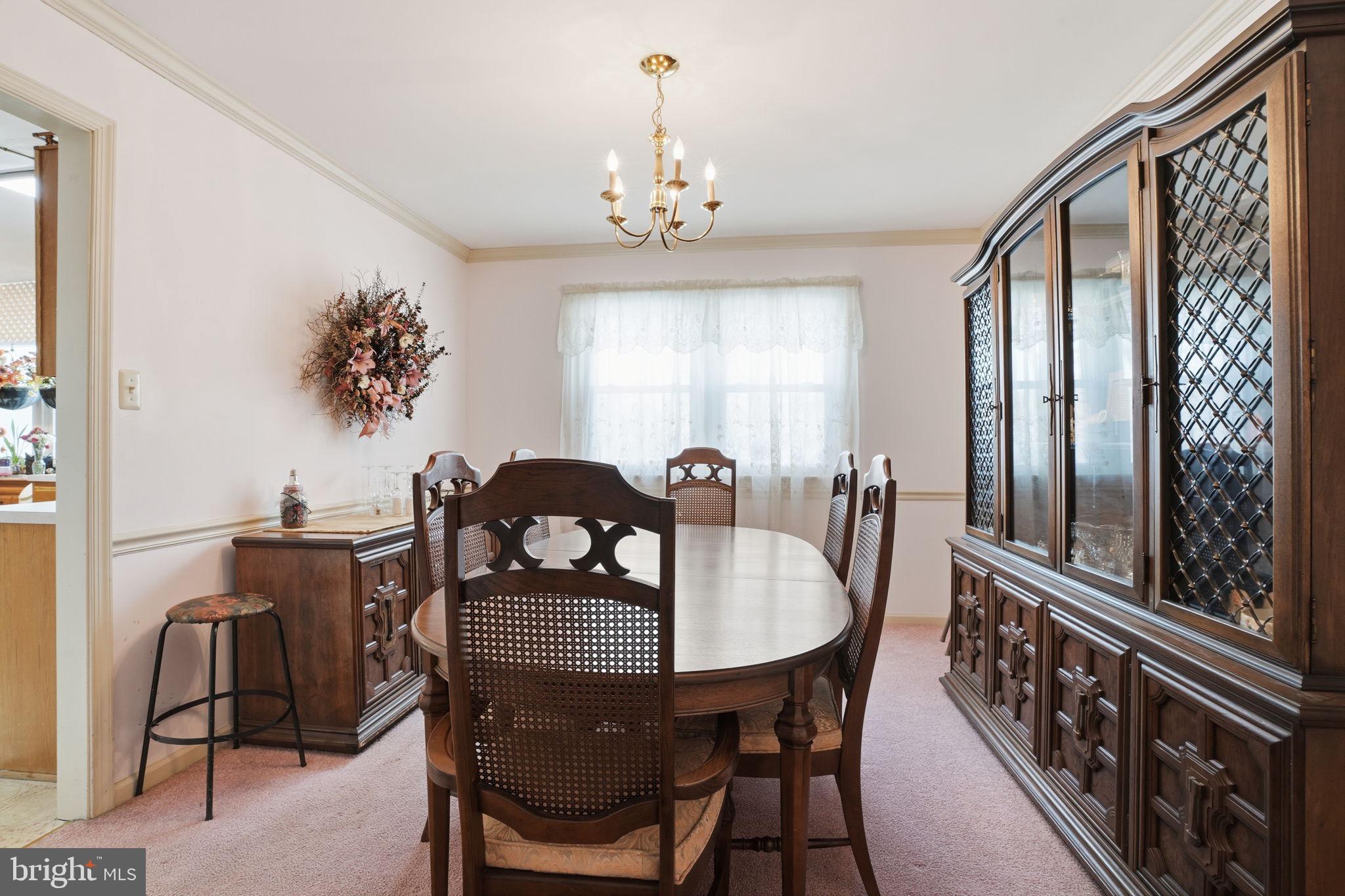 937 High Pointe Circle Langhorne, PA 19047 - Photo 5 of 47 a view of a a dining room with furniture window and wooden floor