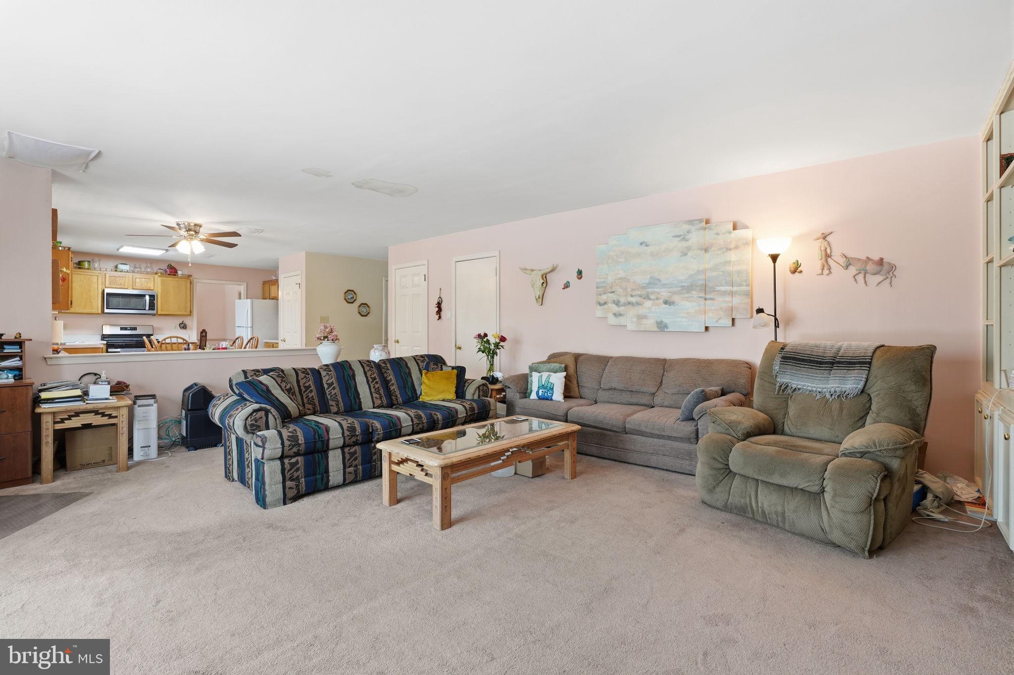 937 High Pointe Circle Langhorne, PA 19047 - Photo 8 of 47 a living room with furniture kitchen view and a window