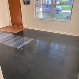 6406 Schiller Street Houston, TX 77055 - Photo 9 of 10 an empty room with wooden floor and windows