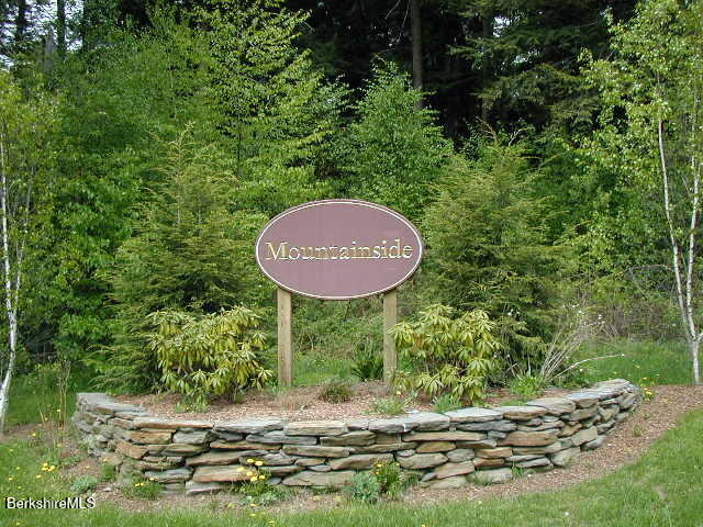 a view of a backyard with a barn