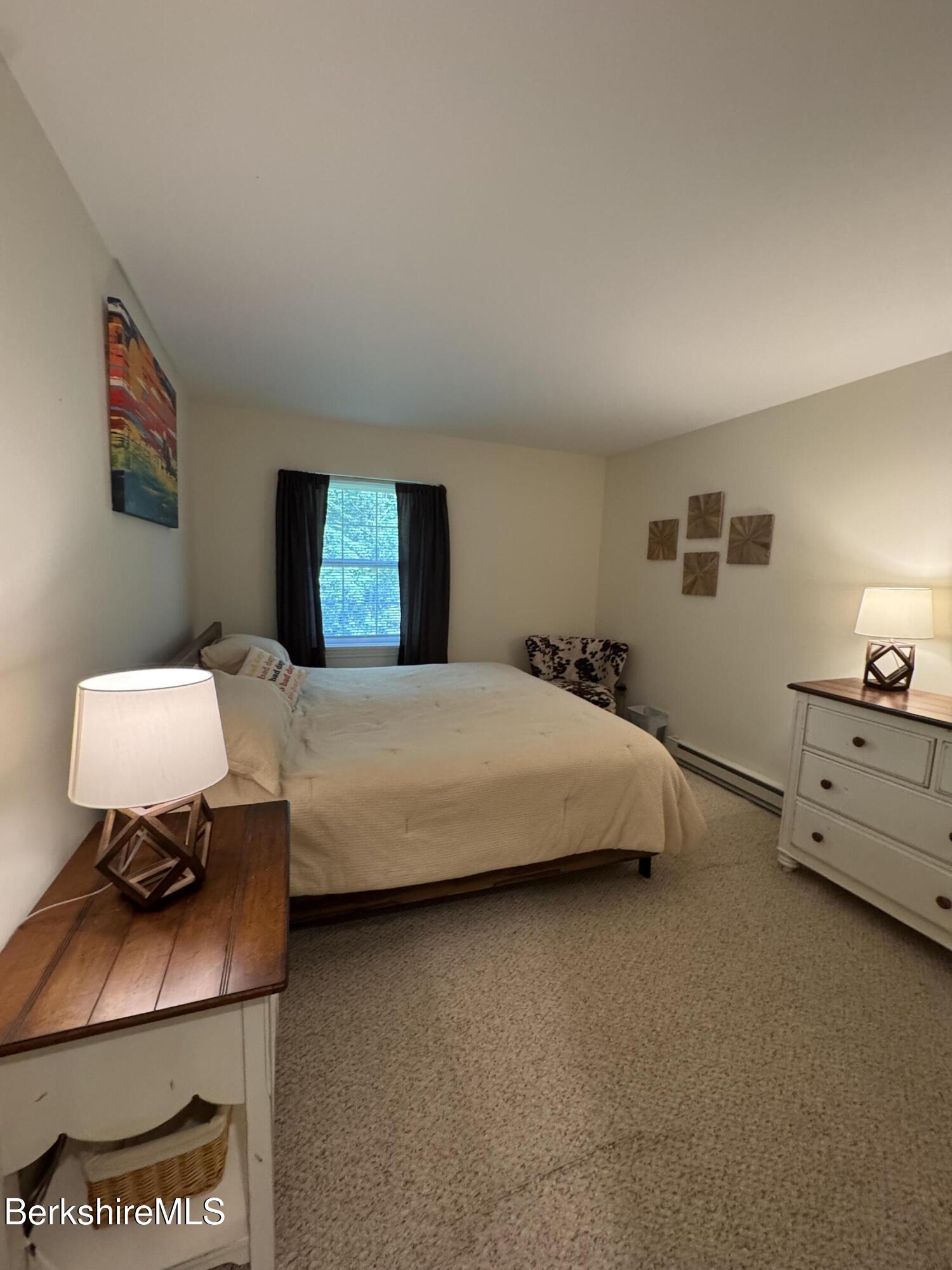 37 Corey Road, Unit 9061 Hancock, MA 01237 - Photo 26 of 29 a bedroom with a bed and window