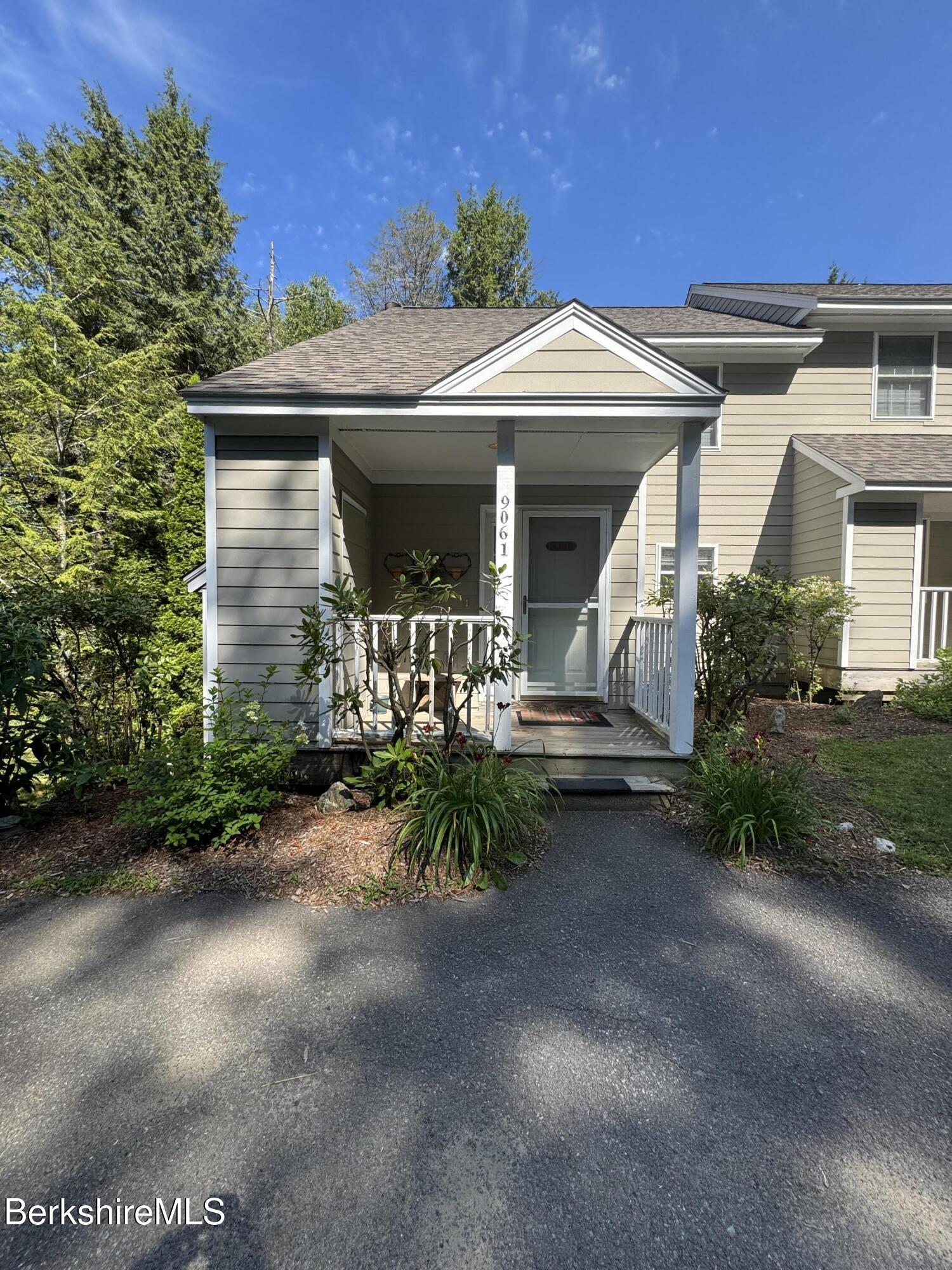 37 Corey Road, Unit 9061 Hancock, MA 01237 - Photo 4 of 30 a front view of a house with yard
