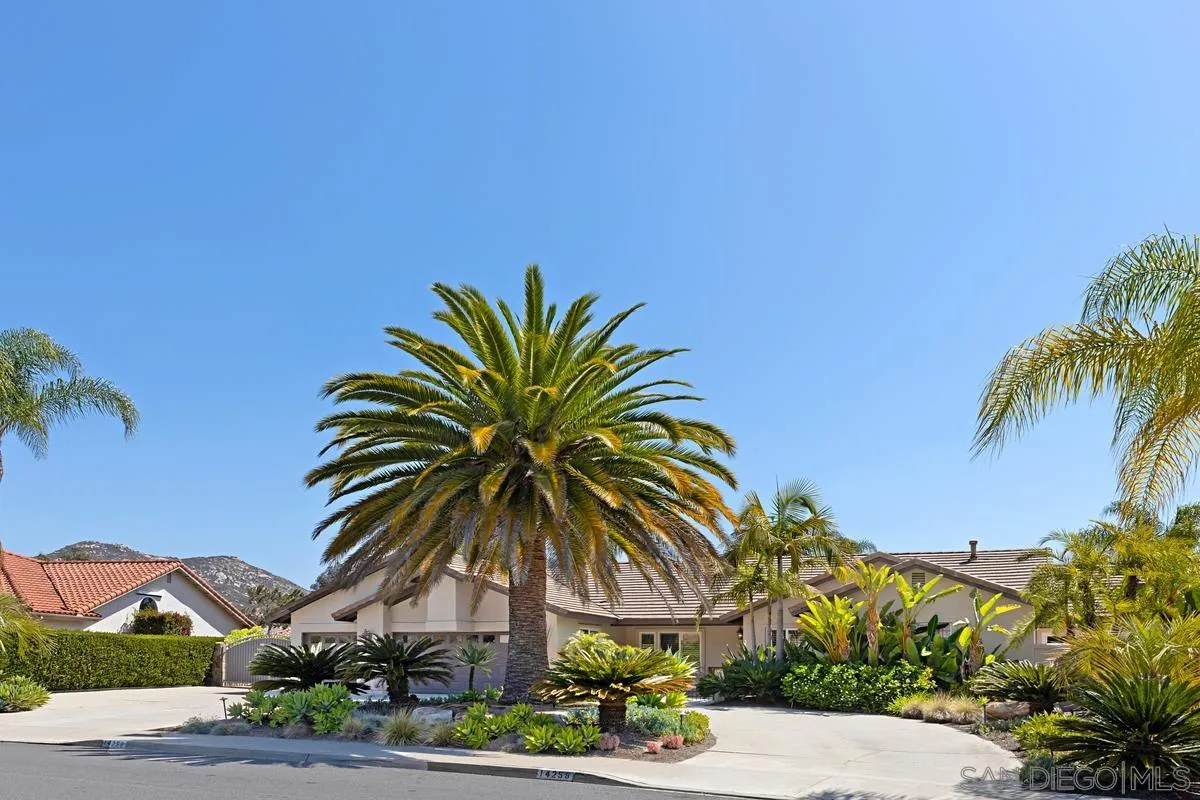 a front view of house with small garden