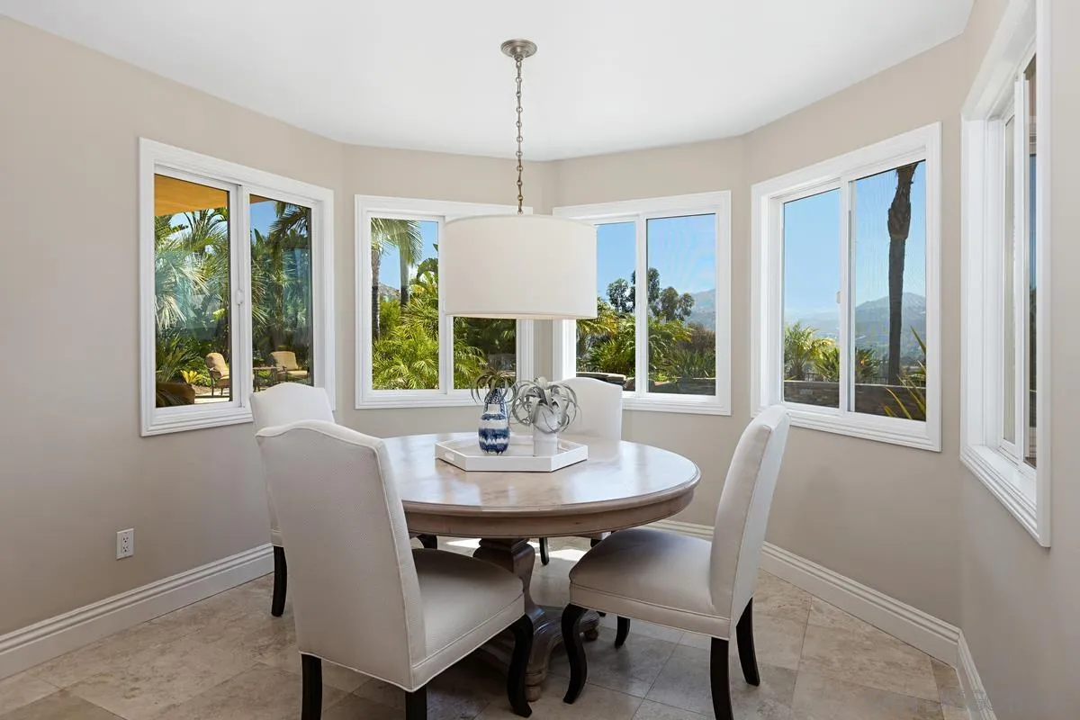 14258 Palisades Drive Poway, CA 92064 - Photo 11 of 40 a view of a dining room with furniture window and outside view
