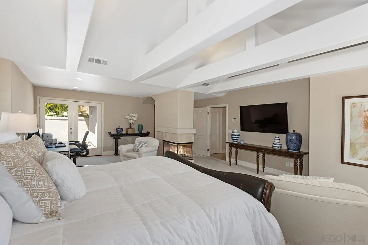 14258 Palisades Drive Poway, CA 92064 - Photo 15 of 40 a bedroom with furniture and a flat screen tv