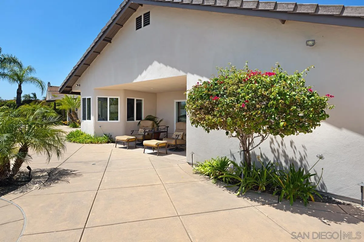 14258 Palisades Drive Poway, CA 92064 - Photo 30 of 40 a view of a house with a yard and potted plants