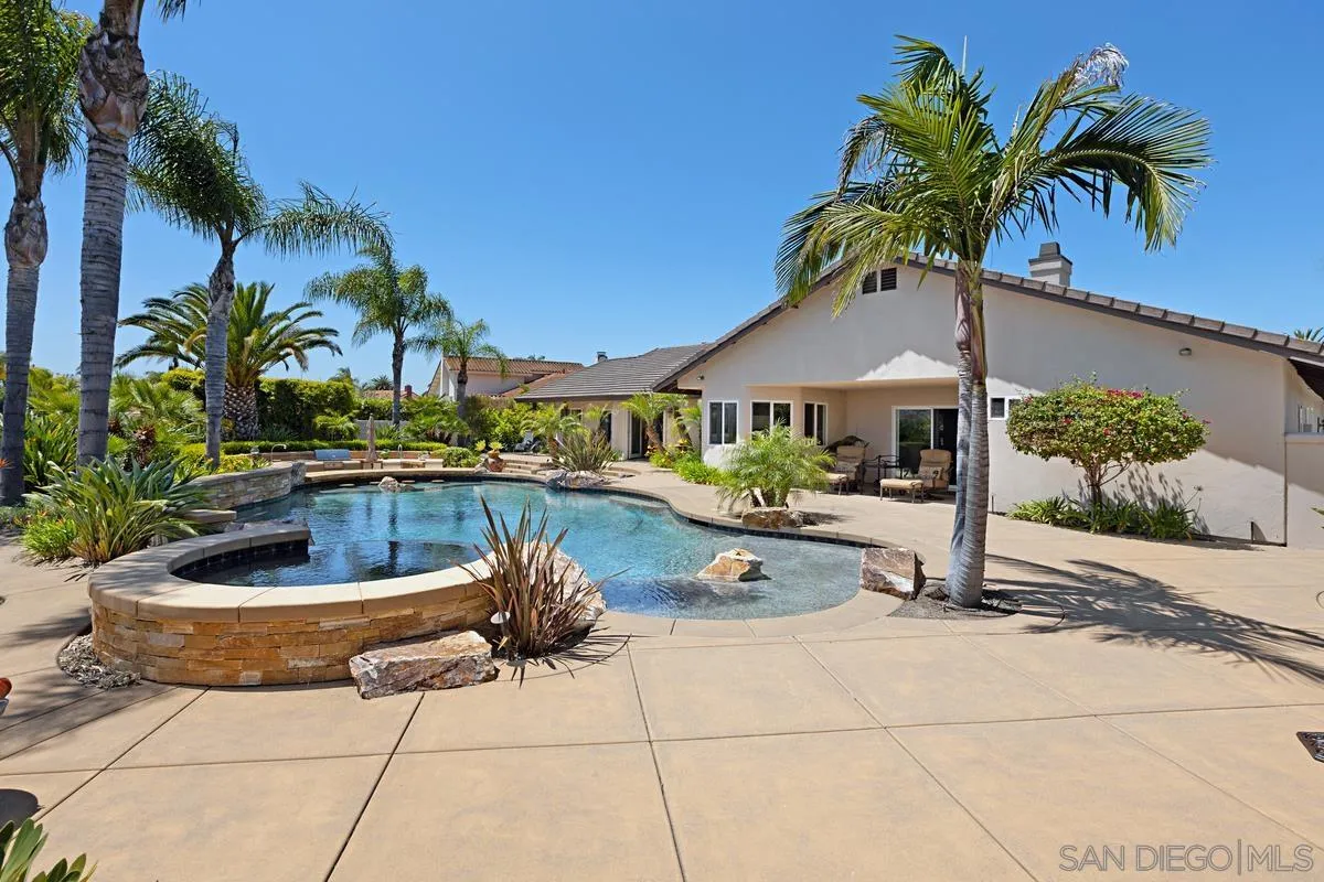 14258 Palisades Drive Poway, CA 92064 - Photo 31 of 40 a view of a house with swimming pool and sitting area