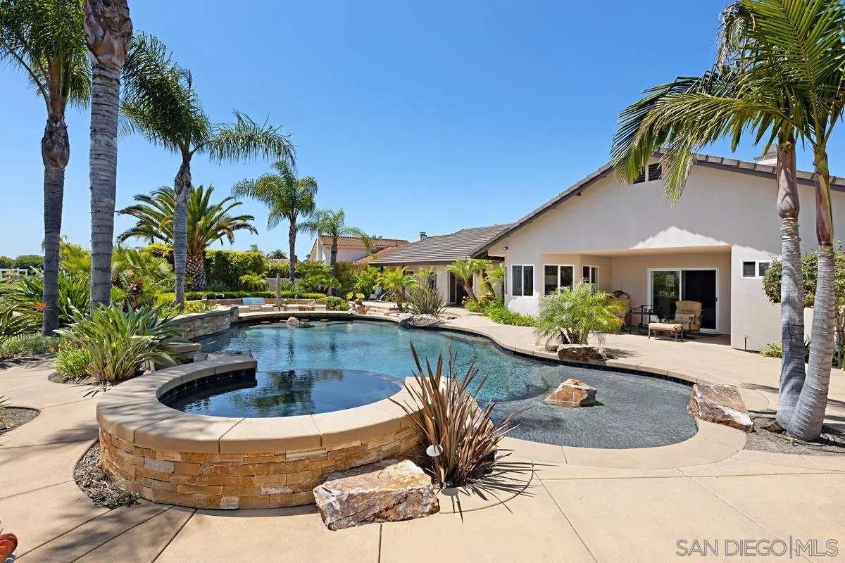 14258 Palisades Drive Poway, CA 92064 - Photo 32 of 40 front view of house with a yard and swimming pool
