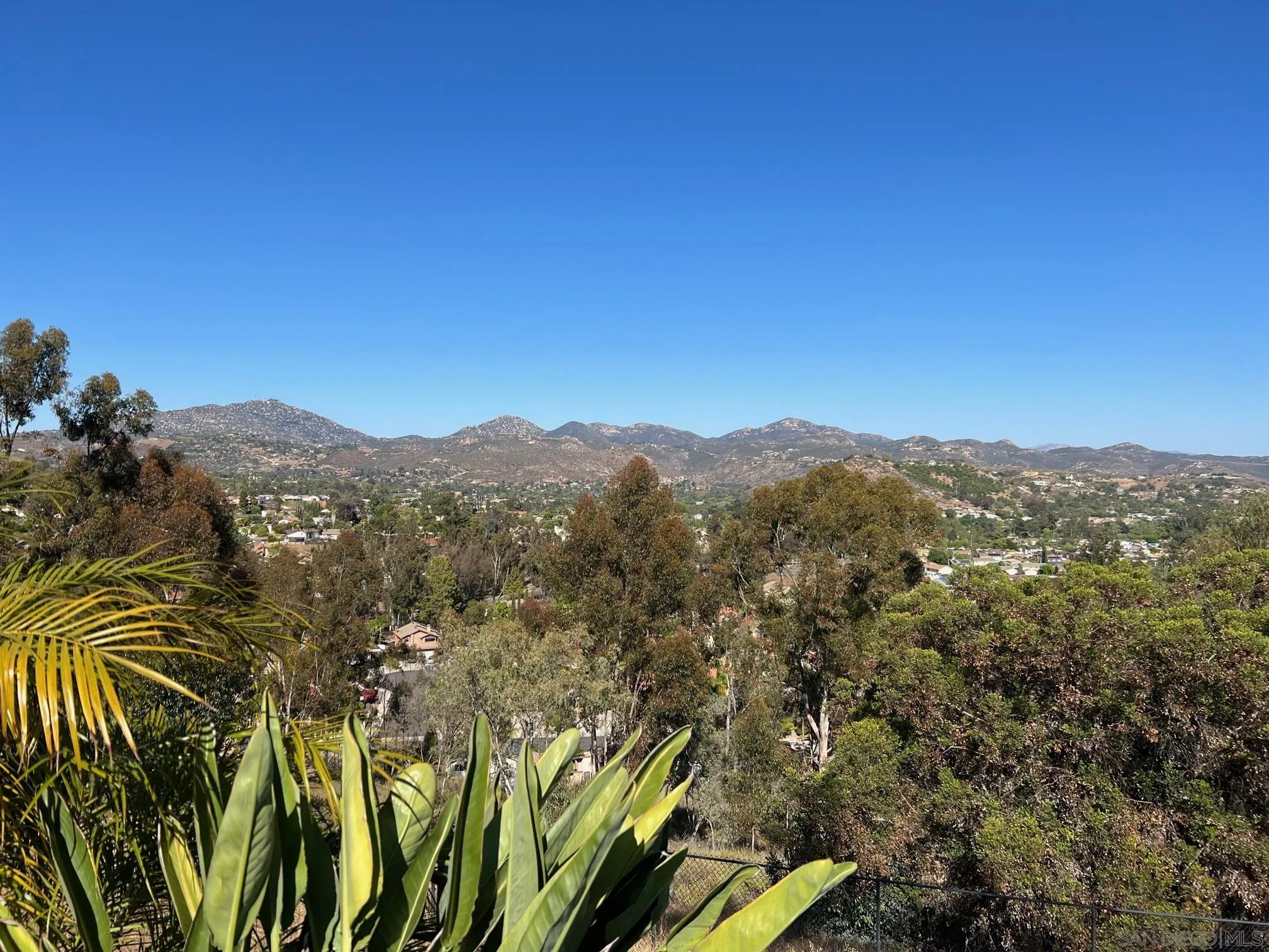 14258 Palisades Drive Poway, CA 92064 - Photo 37 of 40 a view of a city with lush green forest
