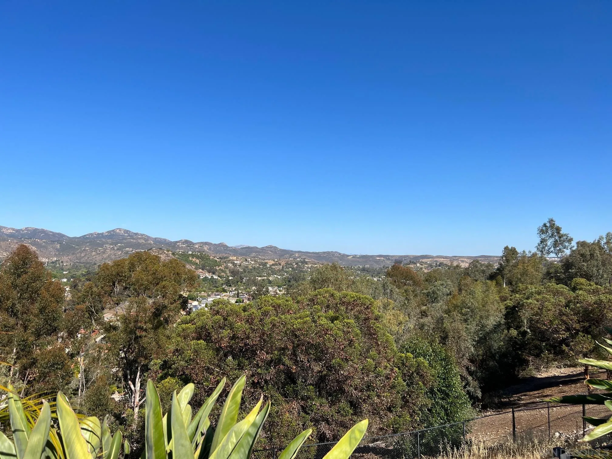 14258 Palisades Drive Poway, CA 92064 - Photo 38 of 40 a view of a city with lush green forest