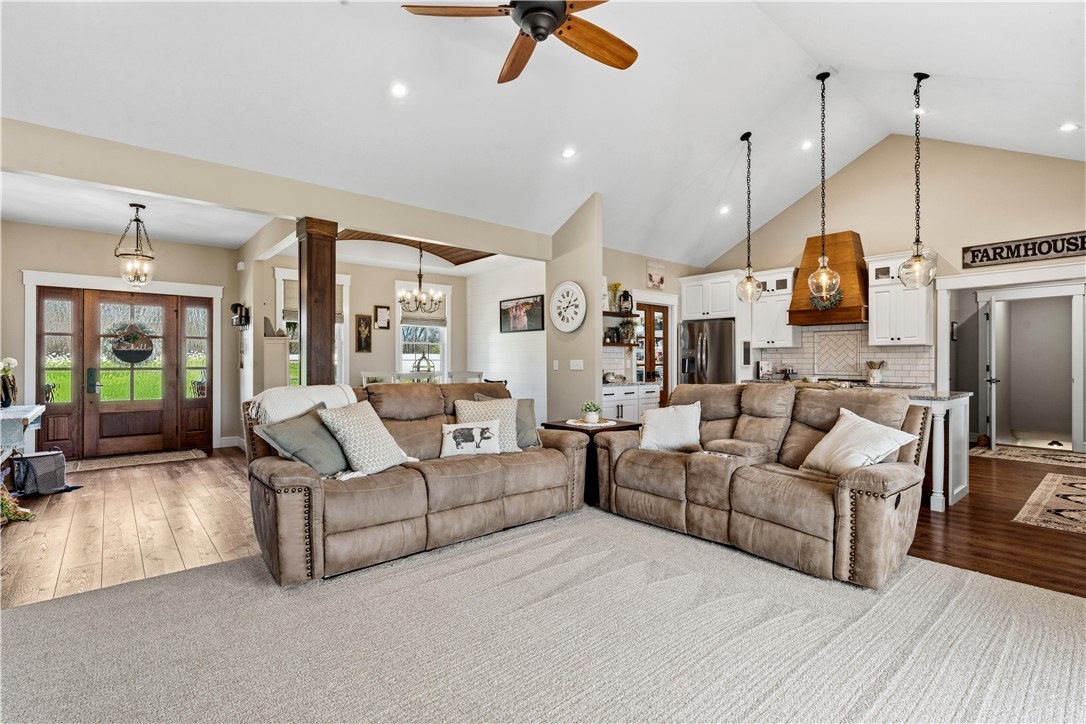 1158 Pyle Road Clarksville, OH 45113 - Photo 16 of 76 This bright and airy interior Great Room features high vaulted ceilings, an open concept layout, and Carpet flooring.