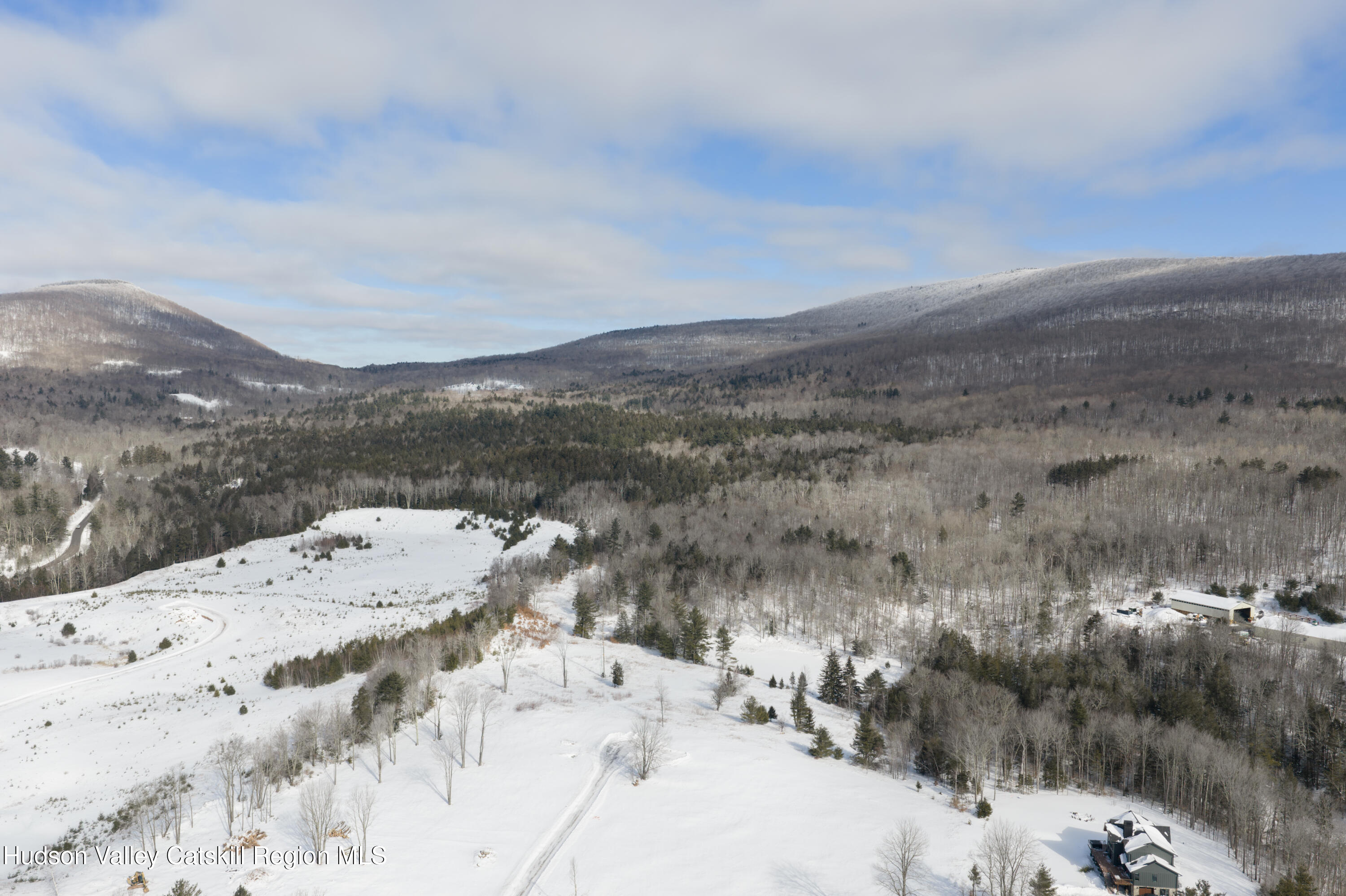 Lot 1 Ruth Court Watervliet, NY 12189 - Photo 8 of 12 a view of a dry yard with mountains in the background