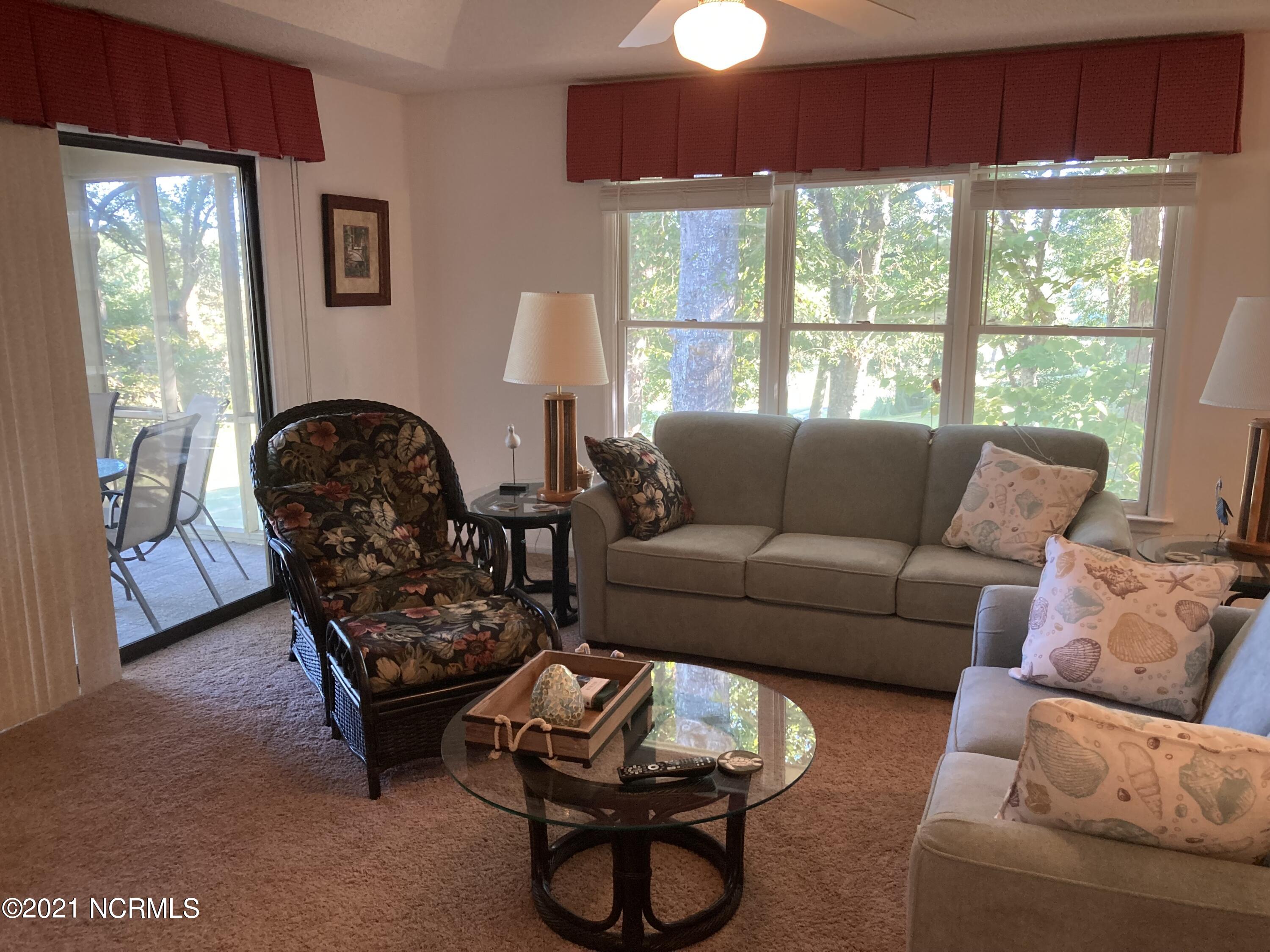 219 Clubhouse Road, Unit 406 Sunset Beach, NC 28468 - Photo 6 of 23 Bonus Sleeper sofa in Living area