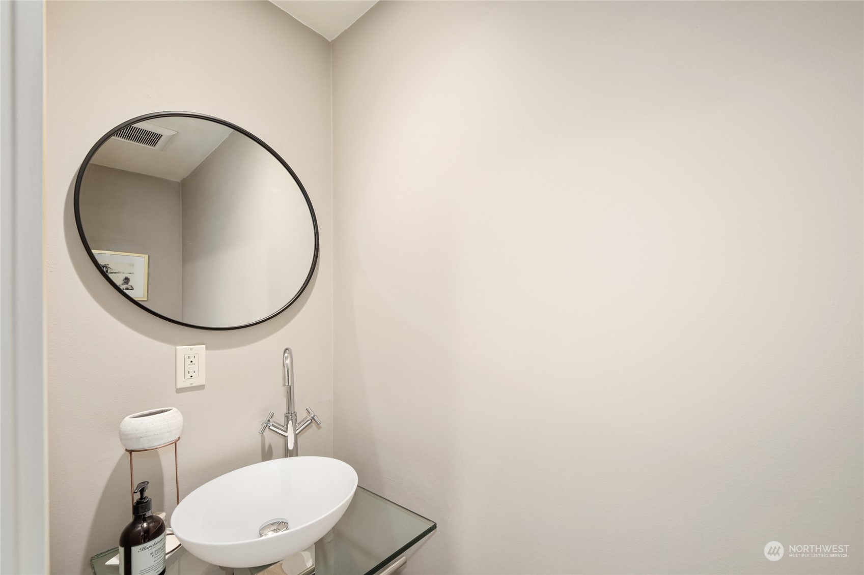 2148 Sunset Avenue Southwest Seattle, WA 98116 - Photo 16 of 40 a bathroom with a toilet and a mirror