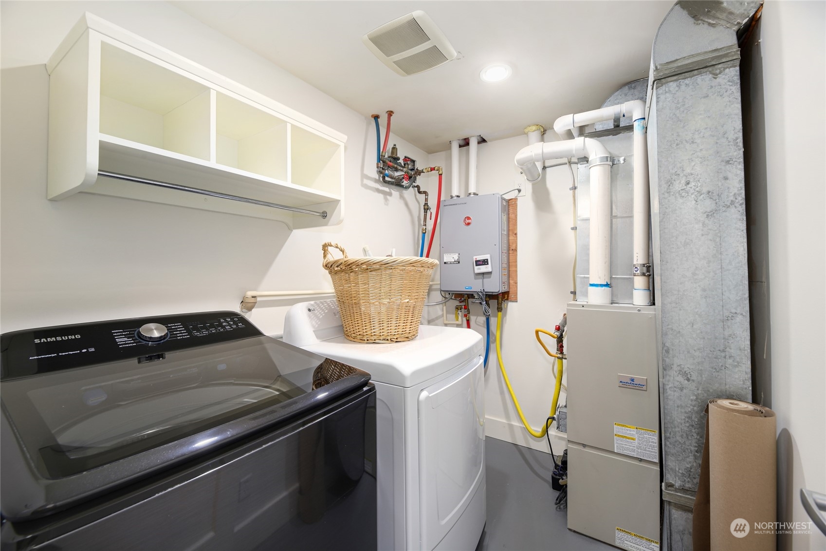 2148 Sunset Avenue Southwest Seattle, WA 98116 - Photo 33 of 40 a utility room with dryer and washer