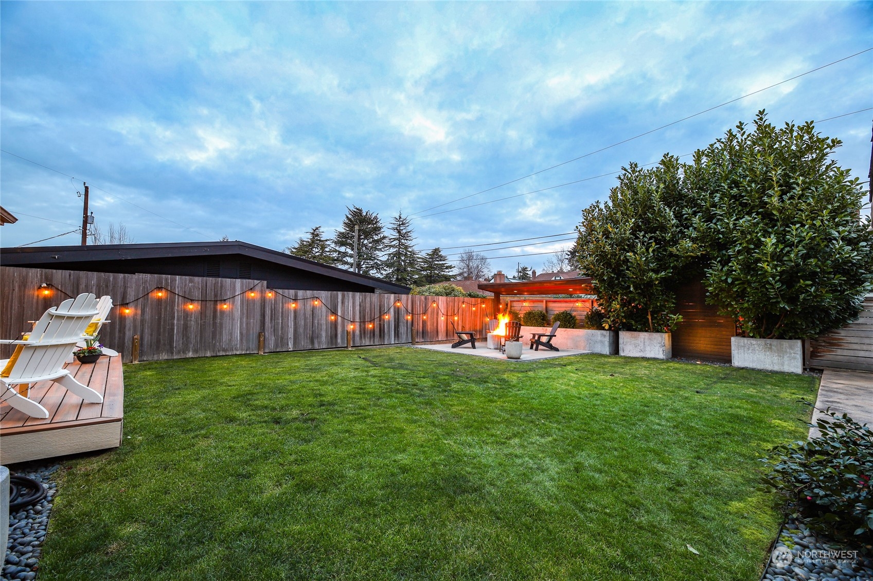 2148 Sunset Avenue Southwest Seattle, WA 98116 - Photo 39 of 40 a front view of a house with garden
