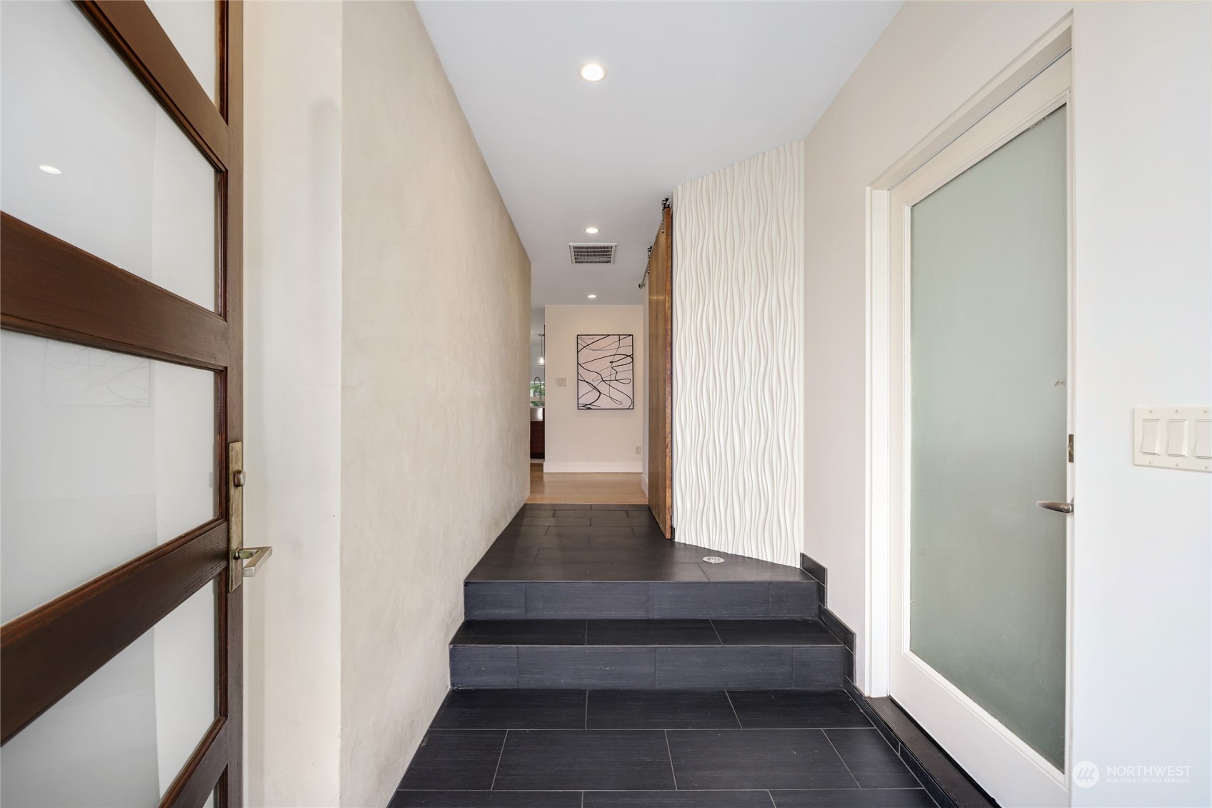 2148 Sunset Avenue Southwest Seattle, WA 98116 - Photo 5 of 40 a view of staircase with white walls and a window