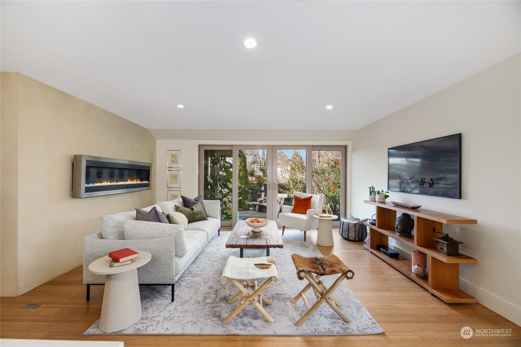 2148 Sunset Avenue Southwest Seattle, WA 98116 - Photo 6 of 40 a living room with furniture and a flat screen tv