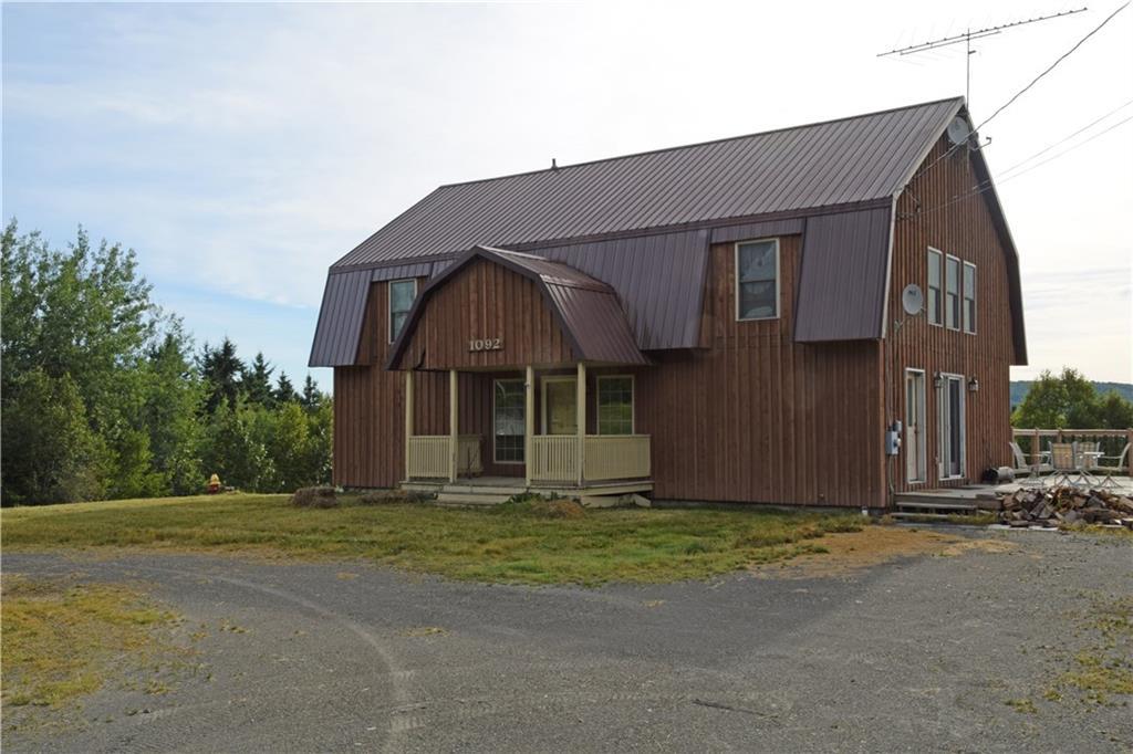 1092 Aroostook Road Wallagrass, ME 04781 - Photo 25 of 25 Wood siding