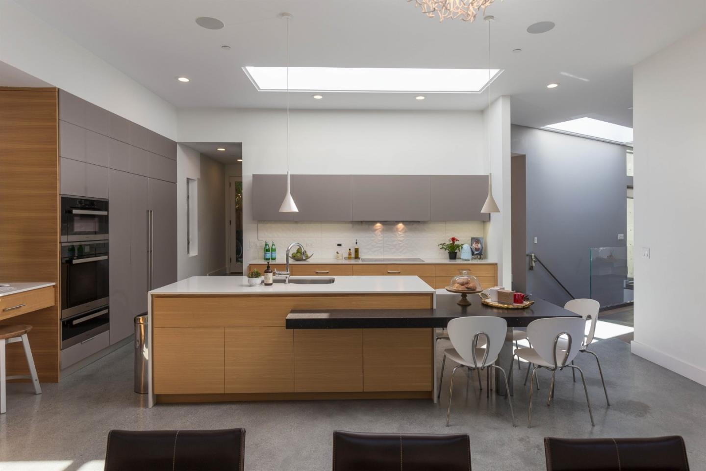 454 Cypress Drive Los Altos, CA 94022 - Photo 9 of 35 a kitchen with kitchen island a sink stainless steel appliances and cabinets