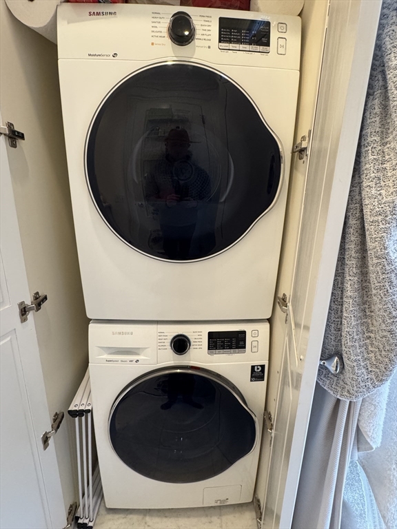 83 Montgomery Street, Unit 2 Boston, MA 02116 - Photo 6 of 11 a utility room with dryer and washer