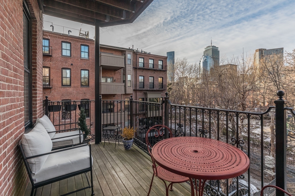83 Montgomery Street, Unit 2 Boston, MA 02116 - Photo 7 of 11 a view of balcony with furniture