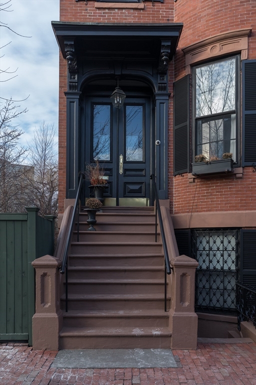 83 Montgomery Street, Unit 2 Boston, MA 02116 - Photo 10 of 11 a view of entryway and hall with wooden floor