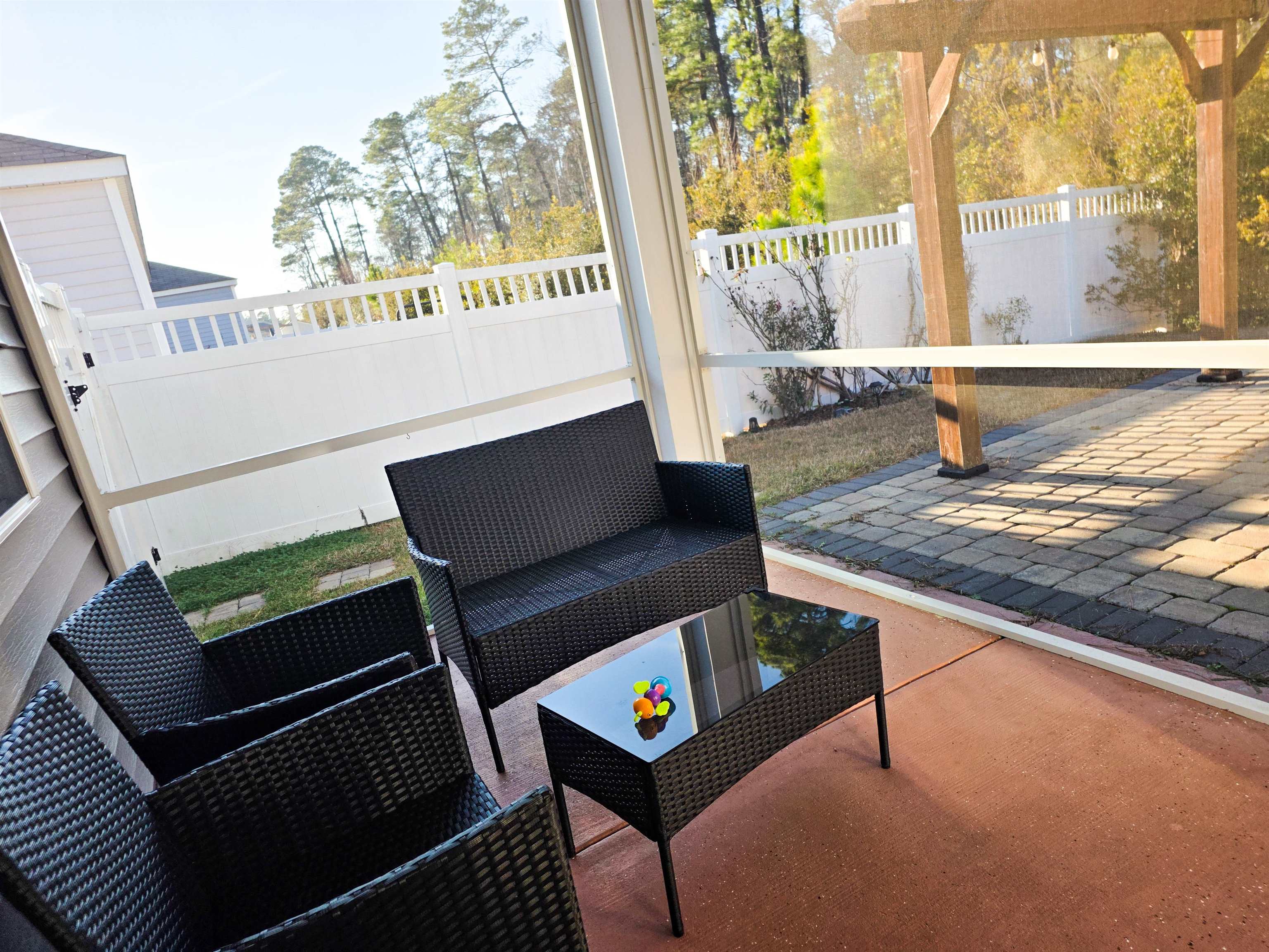 212 Legends Drive Myrtle Beach, SC 29579 - Photo 10 of 18 Fenced backyard with a patio area and outdoor lounge area