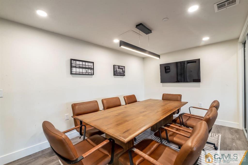 1 Nolan Way, Unit A2 North Brunswick, NJ 08902 - Photo 46 of 71 a view of a dining room with furniture