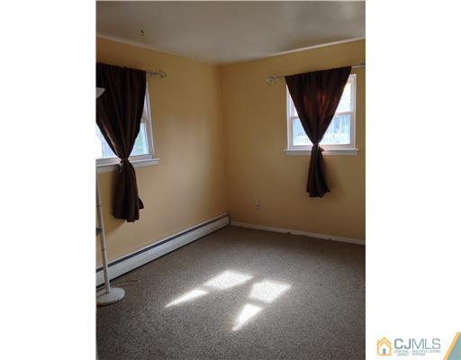 60 Eardley Road Edison, NJ 08817 - Photo 9 of 17 a view of storage and utility room with a window