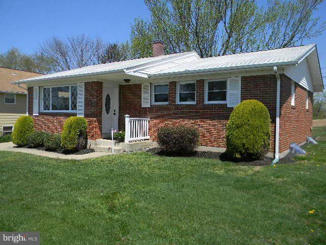 9634 Dundawan Road Baltimore, MD 21236 - Photo 1 of 18 a view of a house with a backyard