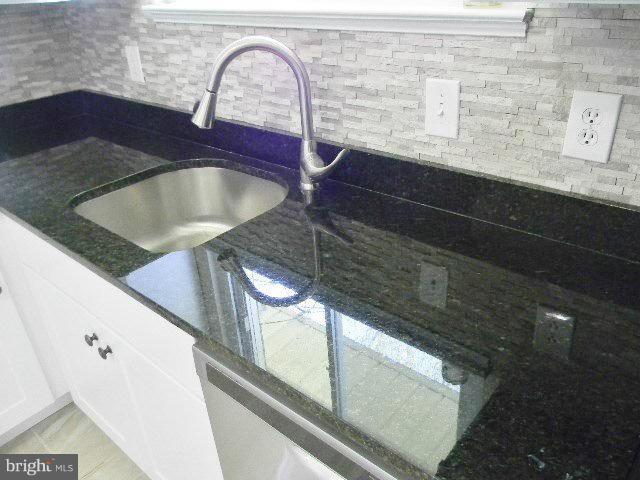 9634 Dundawan Road Baltimore, MD 21236 - Photo 2 of 18 a close view of sink and tap