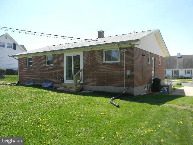 9634 Dundawan Road Baltimore, MD 21236 - Photo 17 of 18 a view of a house with a backyard