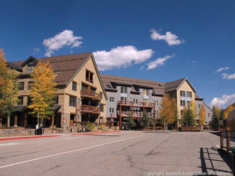 195 River Run Road, Unit 8045 Keystone, CO 80435 - Photo 1 of 15 a city street lined with tall buildings
