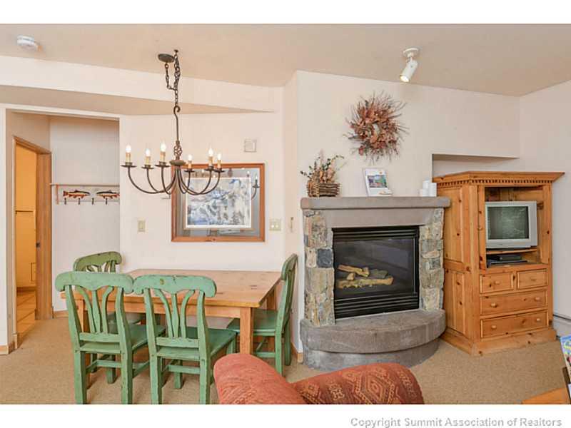 195 River Run Road, Unit 8045 Keystone, CO 80435 - Photo 5 of 15 a living room with furniture and a fireplace
