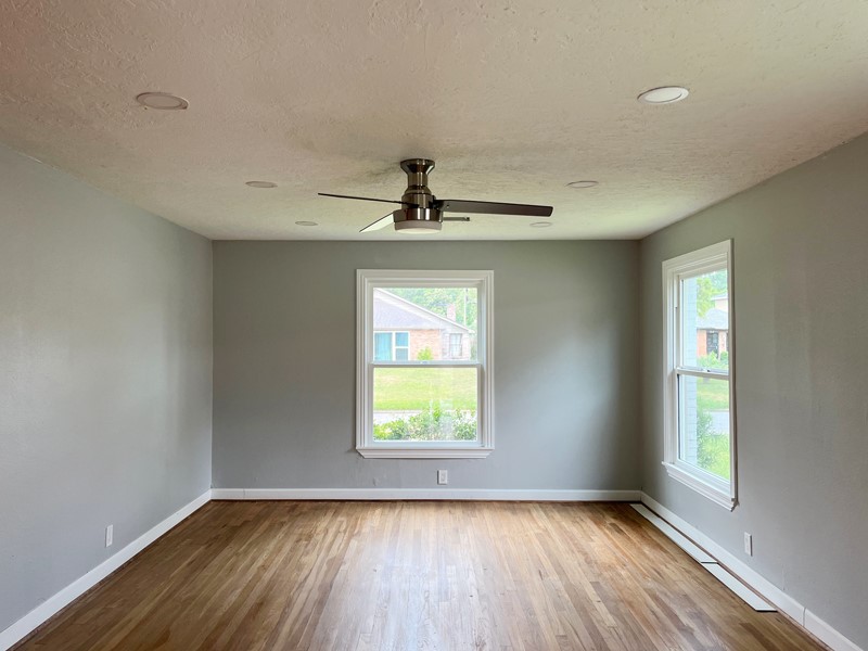 3522 Rosedale Street Houston, TX 77004 - Photo 17 of 22 wooden floor in an empty room with a window