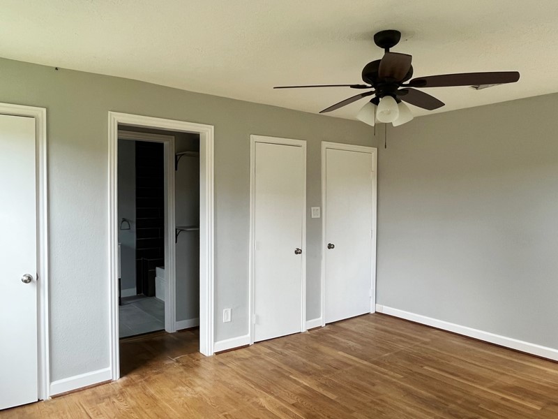 3522 Rosedale Street Houston, TX 77004 - Photo 7 of 22 an empty room and chandelier fan